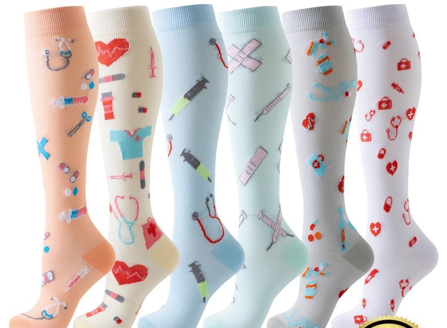 Six pairs of pastel compression socks with soft printed patterns